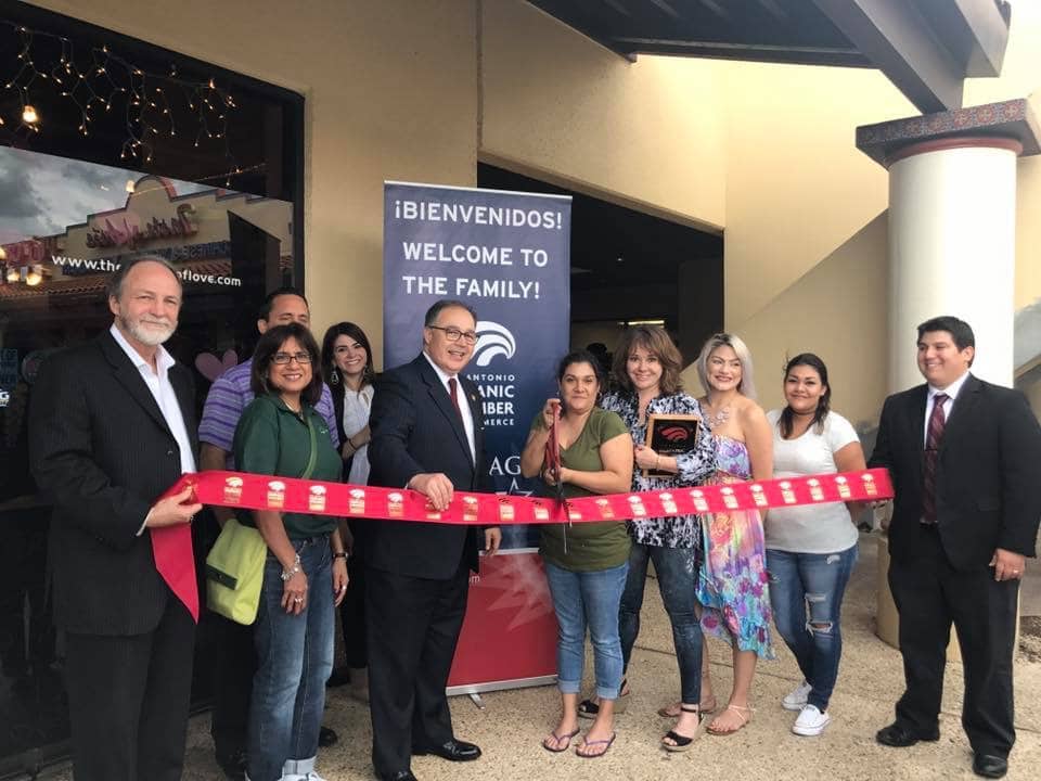 cutting the ribbon on shades of love