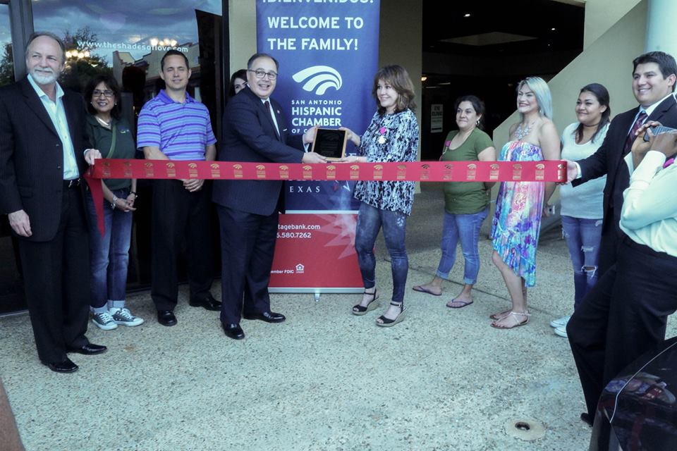 rita delgado receives a plaque from the san antonio hispanic chamber of commerce